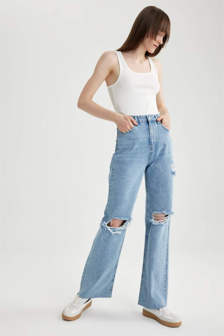 بنطلون جينز 90’S برجل واسع ممزق