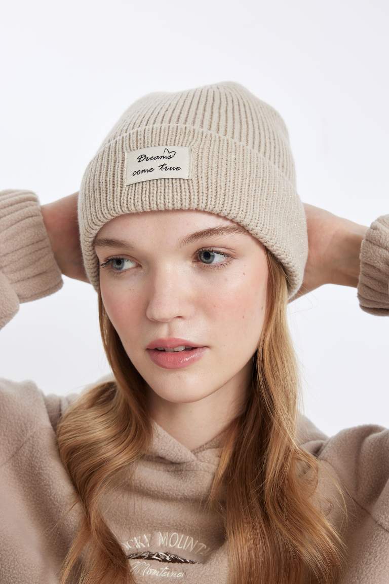 Woman Woven Labeled Beanie