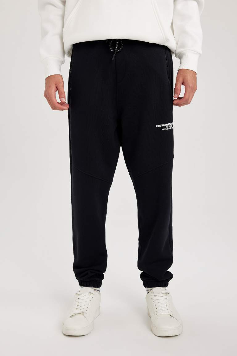 Black MAN Regular Fit Zipper Pocket Sweatpants 2833333 | DeFacto