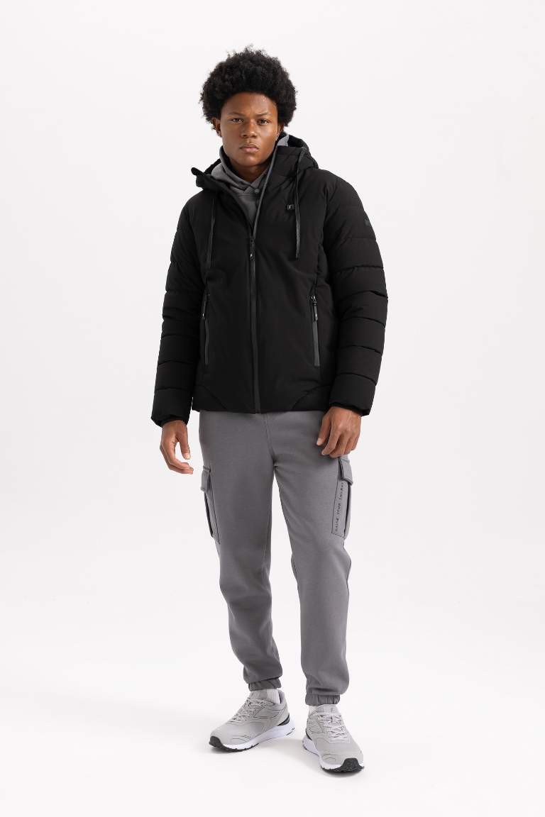 DeFactoFit Su İtici Slim Fit Kapüşonlu Isıtıcılı Mont