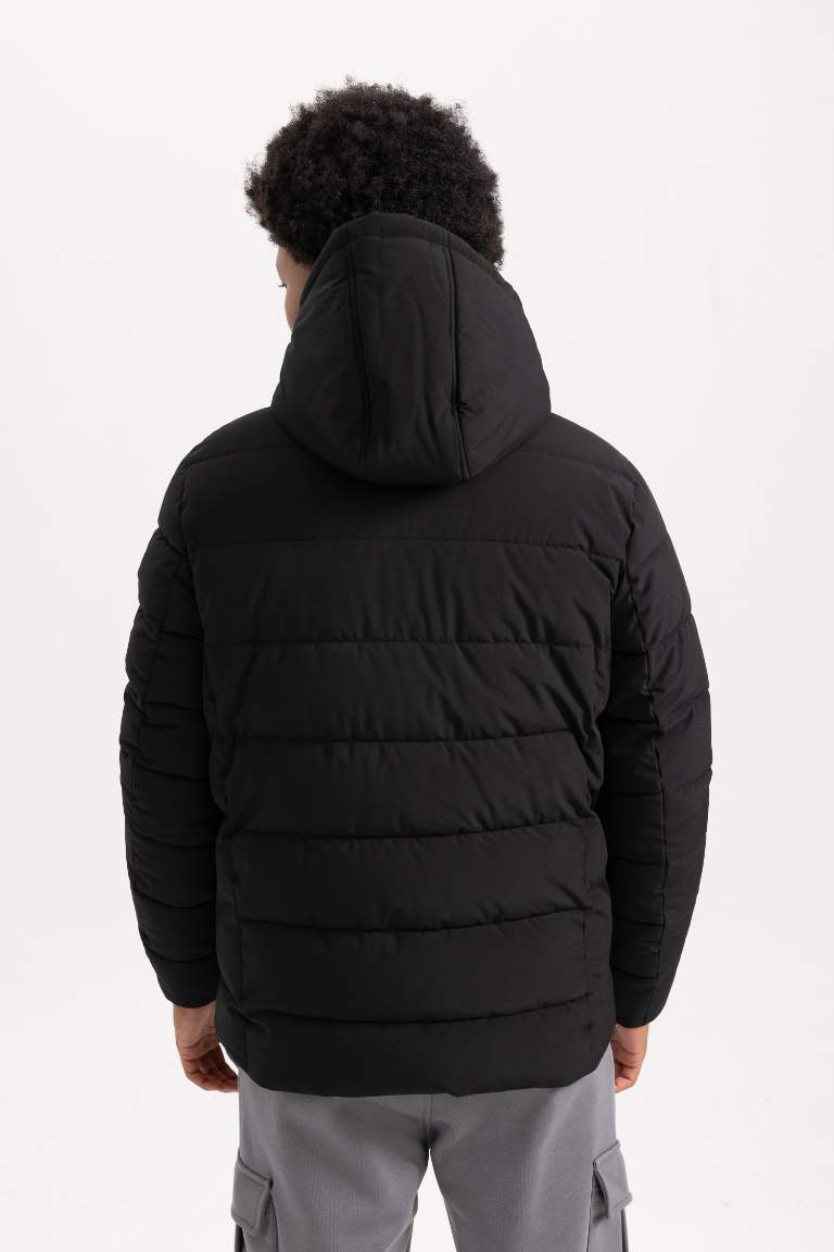 DeFactoFit Su İtici Slim Fit Kapüşonlu Isıtıcılı Mont