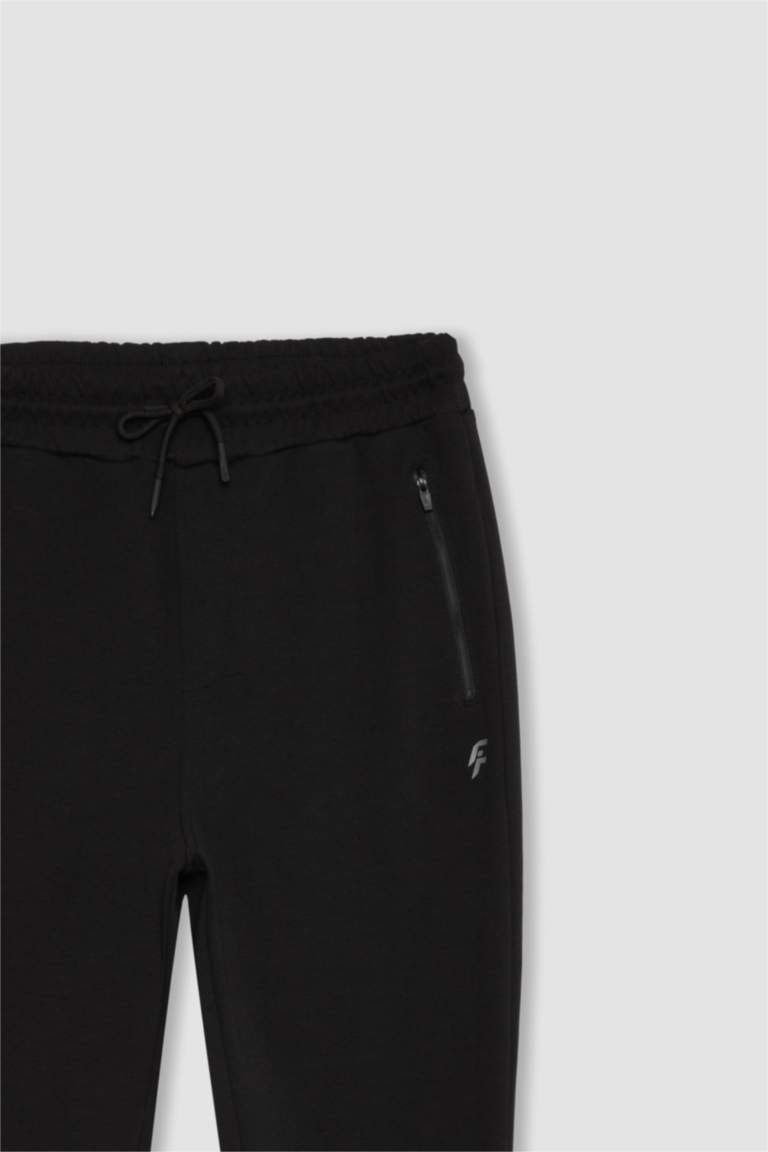 DeFactoFit İnce Jogger Eşofman Altı Slim Fit Dar Kesim Dar Paça Fermuarlı Cepli