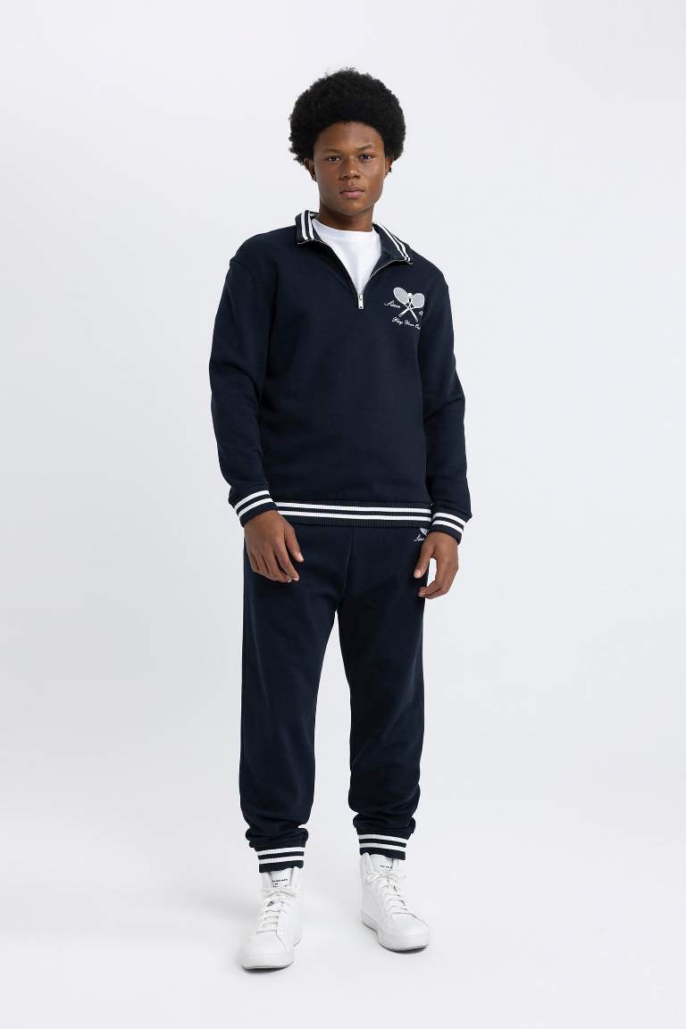 DeFactoFit Standart Fit Dik Yaka Sporcu Yarım Fermuarlı Baskılı Sweatshirt