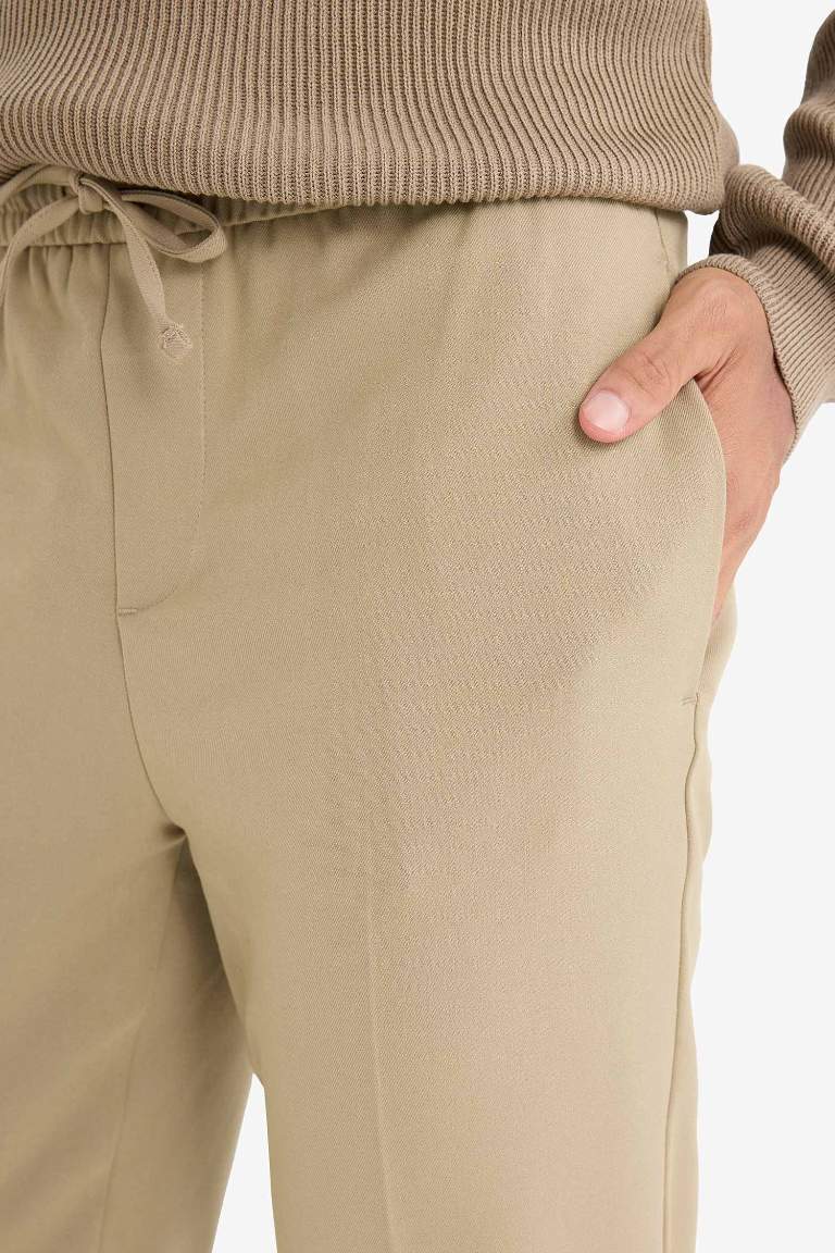 Yazlık Kumaş Jogger Pantolon Beli Bağcıklı Lastikli Düz Paça Cepli Her Yöne Esneyen