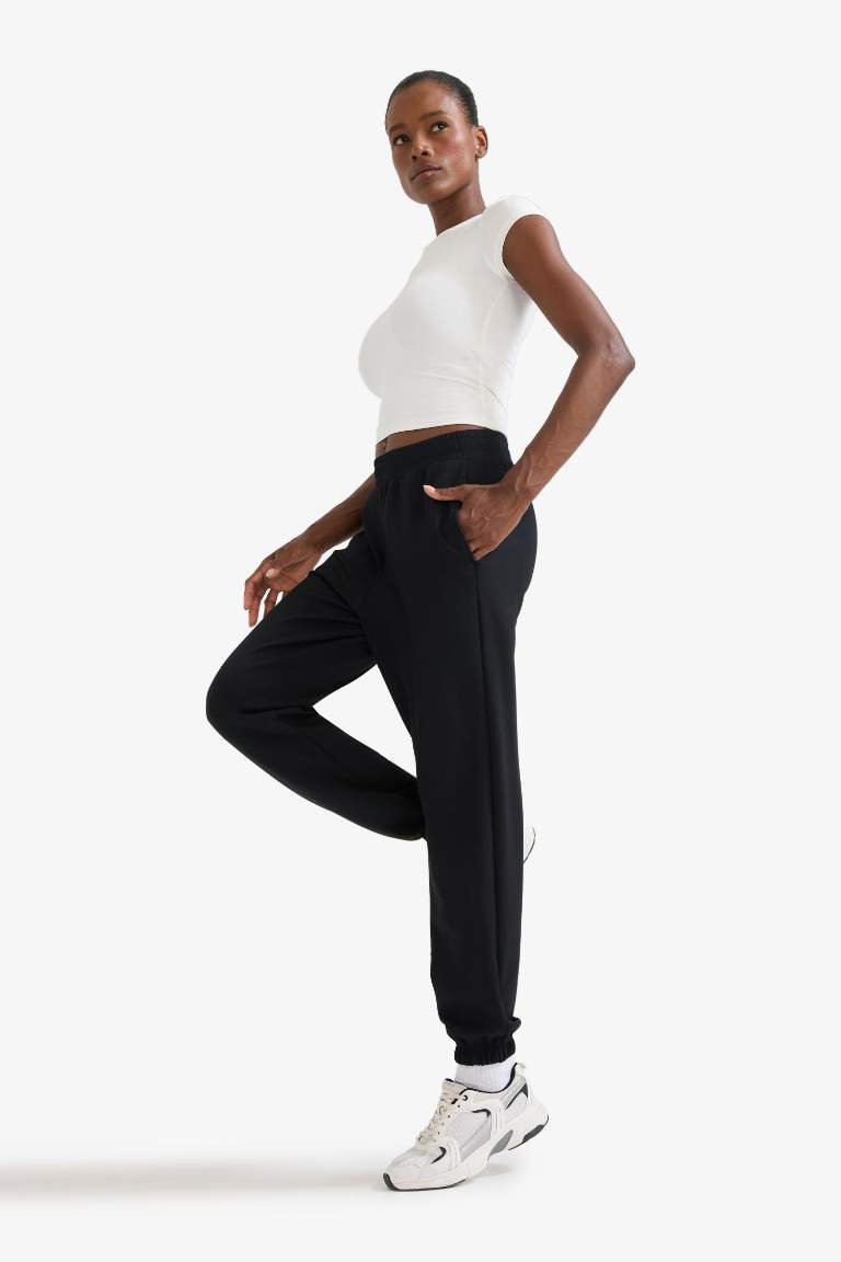 Спортивные брюки Jogger DeFactoFit стандартного кроя из модала с двумя карманами