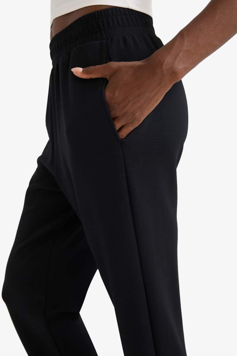 Спортивные брюки Jogger DeFactoFit стандартного кроя из модала с двумя карманами