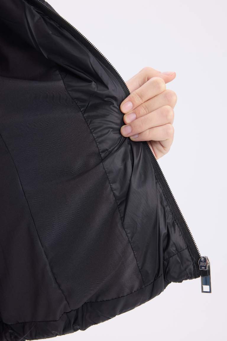 Doudoune à capuche imperméable à fermeture zip et poches