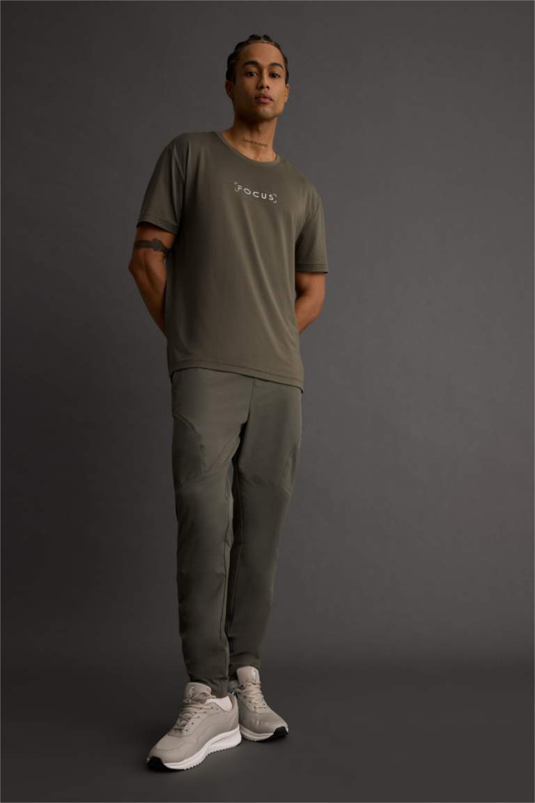 DeFactoFit Slim Fit Dar Kesim Çift Cepli Dokuma Jogger Eşofman Altı