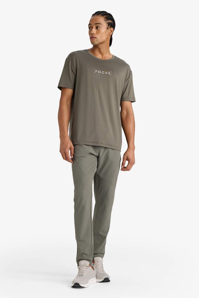 DeFactoFit Slim Fit Dar Kesim Çift Cepli Dokuma Jogger Eşofman Altı