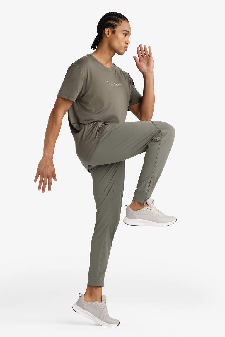 DeFactoFit Slim Fit Dar Kesim Çift Cepli Dokuma Jogger Eşofman Altı