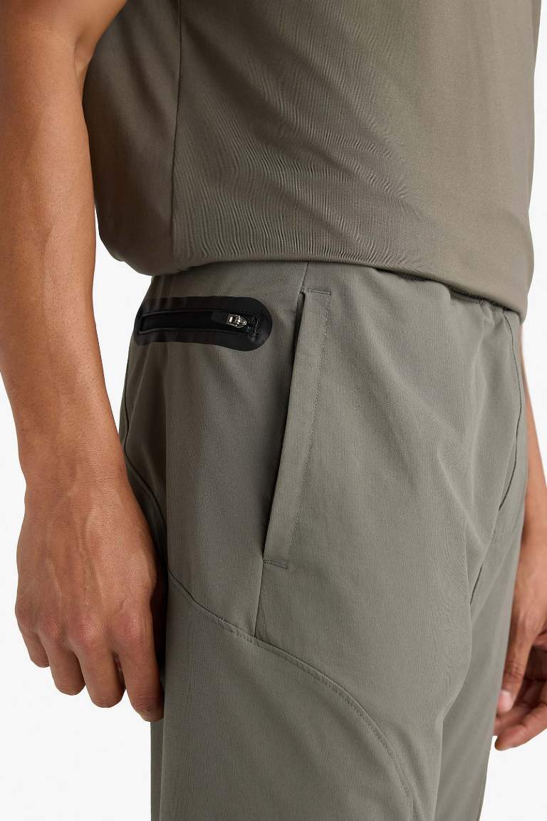 DeFactoFit Slim Fit Dar Kesim Çift Cepli Dokuma Jogger Eşofman Altı