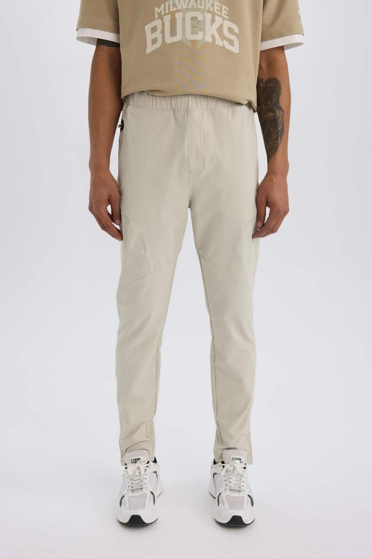 بنطلون بجامة رياضي جوجر منسوج سليم فيت من DeFactoFit