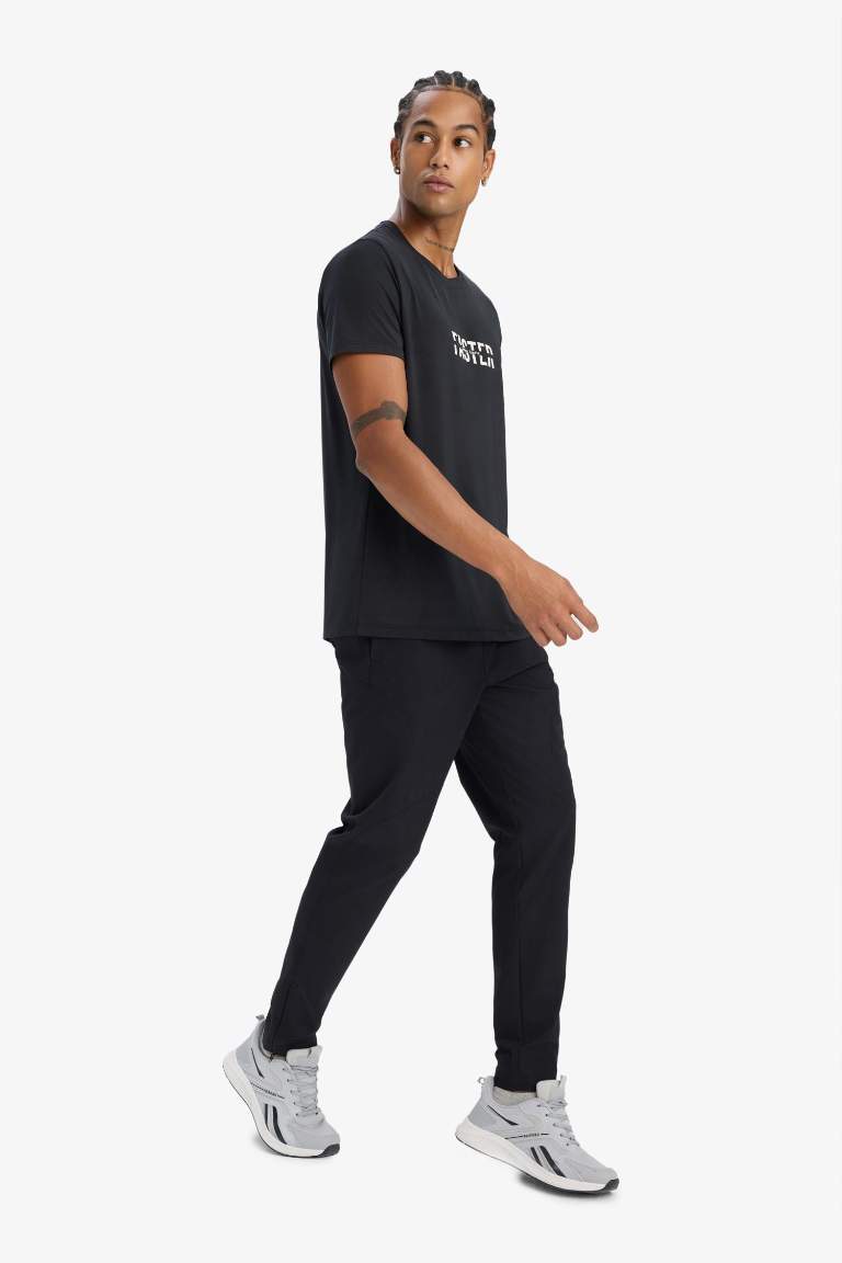 DeFactoFit Esnek Kumaş Sporcu Jogger Eşofman Altı Slim Fit Dar Kesim Dokuma Üç Cepli Fermuarlı Paça