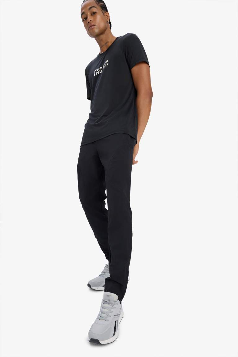 DeFactoFit Esnek Kumaş Sporcu Jogger Eşofman Altı Slim Fit Dar Kesim Dokuma Üç Cepli Fermuarlı Paça