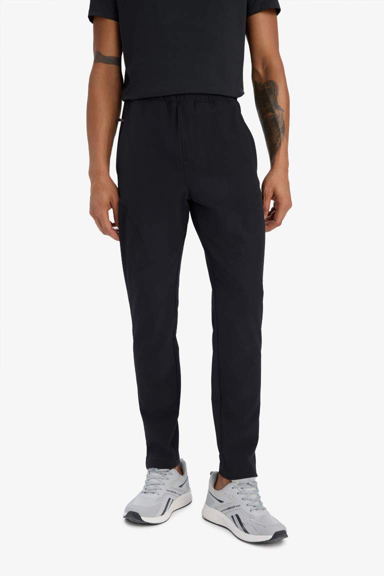 DeFactoFit Slim Fit Zippered Leg Woven Joggers