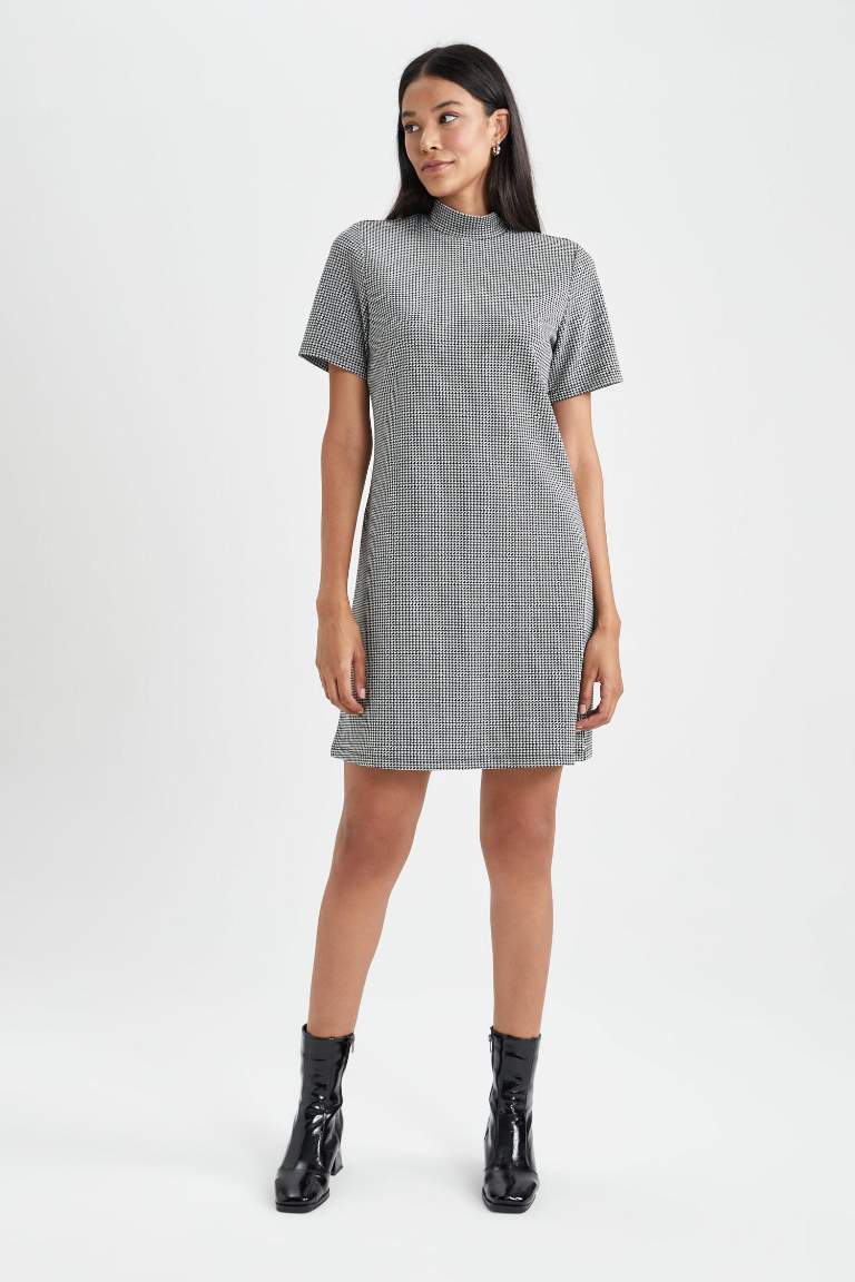 A Cut Half Turtleneck Crowbar Mini Dress