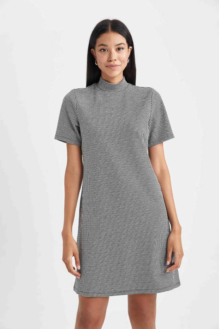 A Cut Half Turtleneck Crowbar Mini Dress