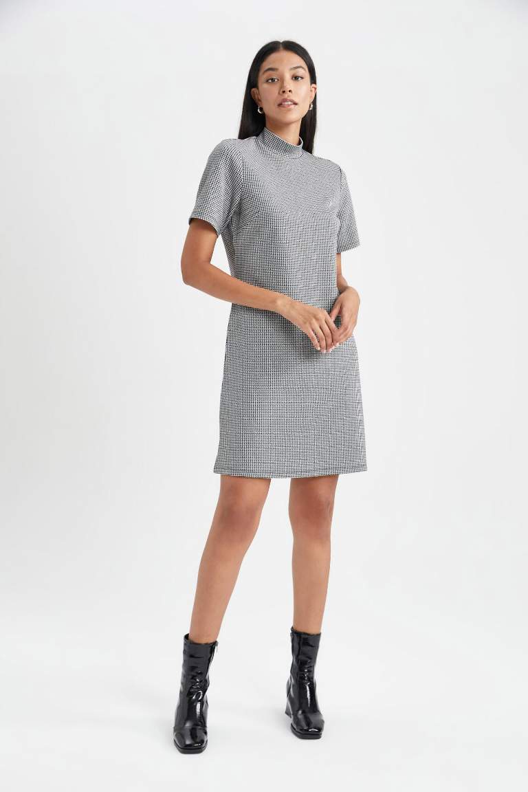 A Cut Half Turtleneck Crowbar Mini Dress