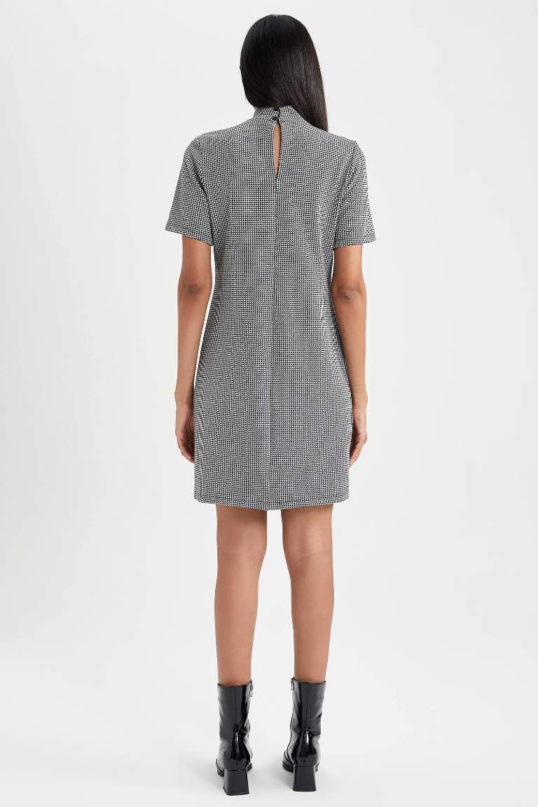 A Cut Half Turtleneck Crowbar Mini Dress