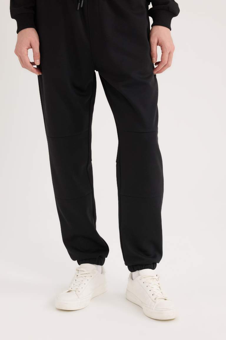 Pantalon de jogging avec poches et fermeture zip à coupe régulière