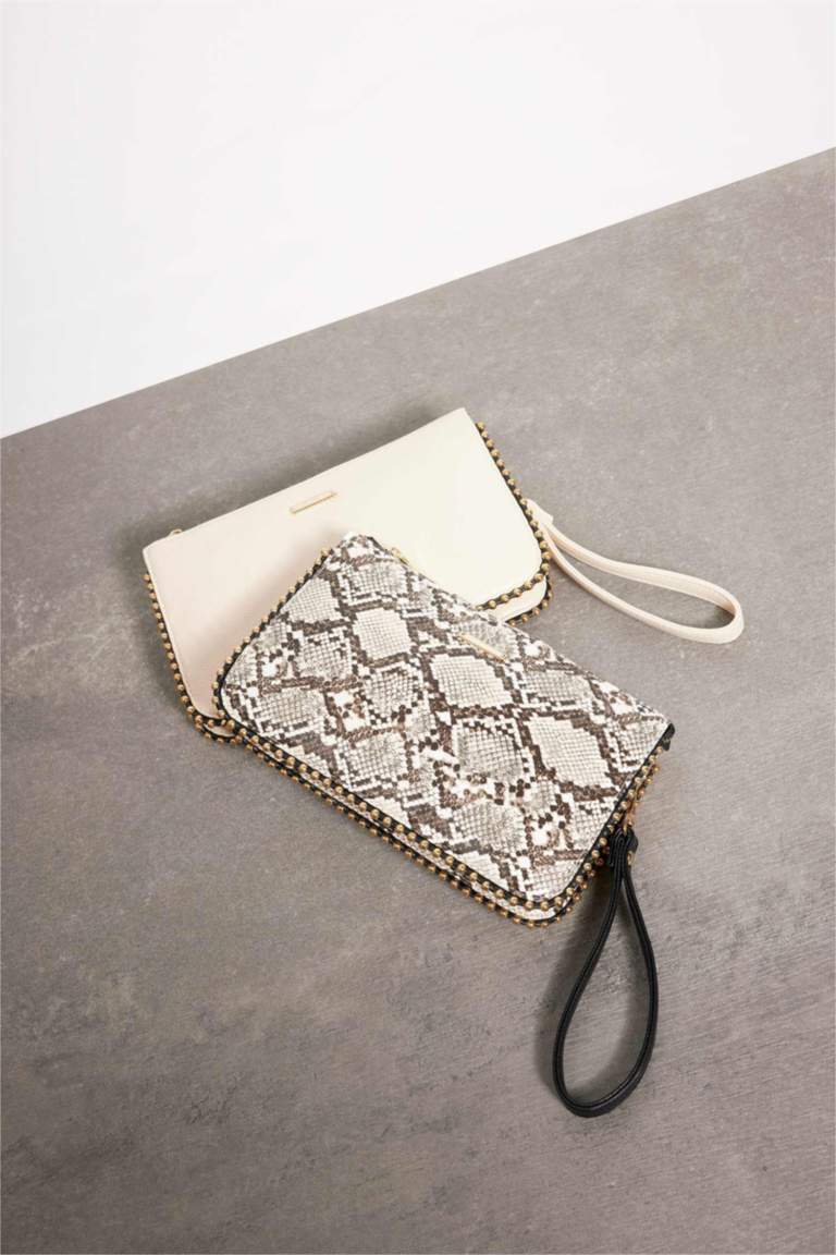 شنطة يد حريمي ذو مظهر جينز بنمط جلد الثعبان