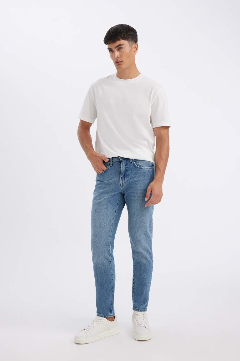 Pantalon Jean Slim  à Taille Normale et Jambe ajustées