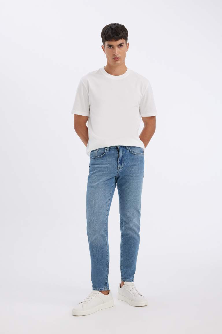 Pantalon Jean Slim  à Taille Normale et Jambe ajustées