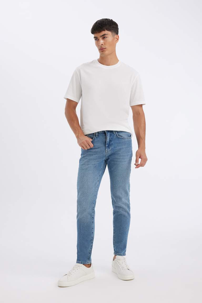 Pantalon Jean Slim  à Taille Normale et Jambe ajustées