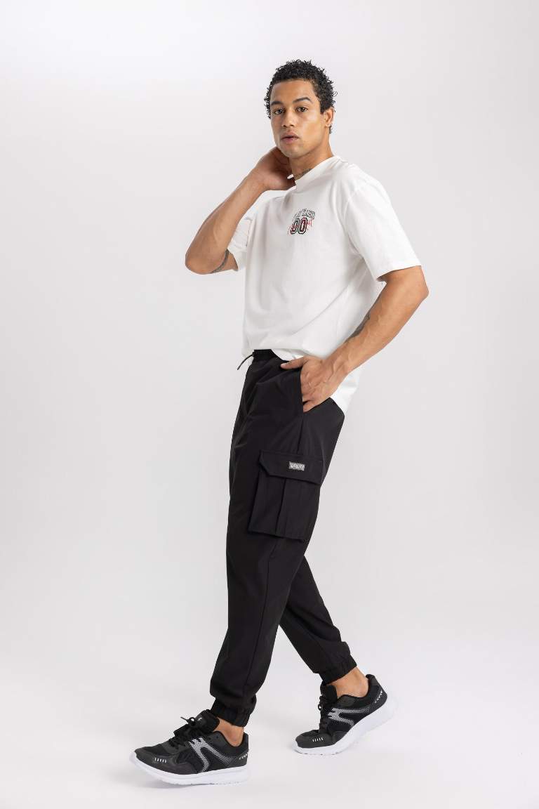 DeFactoFit Sporcu Jogger Eşofman Altı Standart Fit Kargo Cepli Dokuma Beli Paçası Lastikli