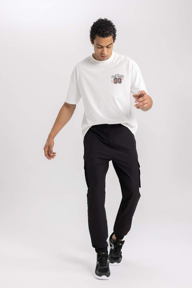 DeFactoFit Sporcu Jogger Eşofman Altı Standart Fit Kargo Cepli Dokuma Beli Paçası Lastikli