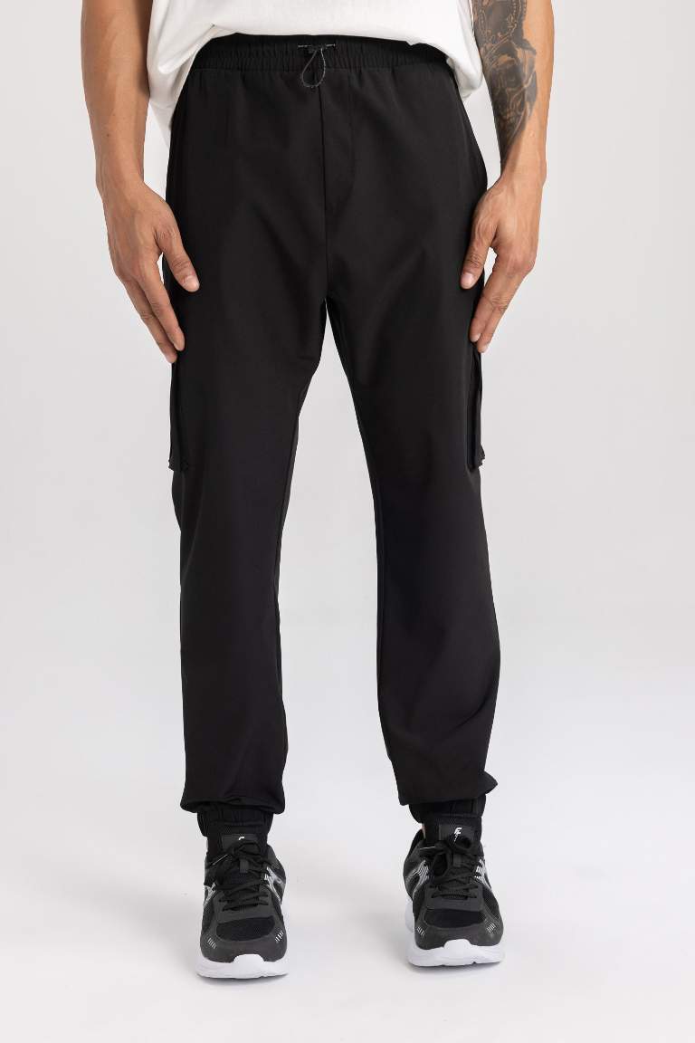 DeFactoFit Sporcu Jogger Eşofman Altı Standart Fit Kargo Cepli Dokuma Beli Paçası Lastikli