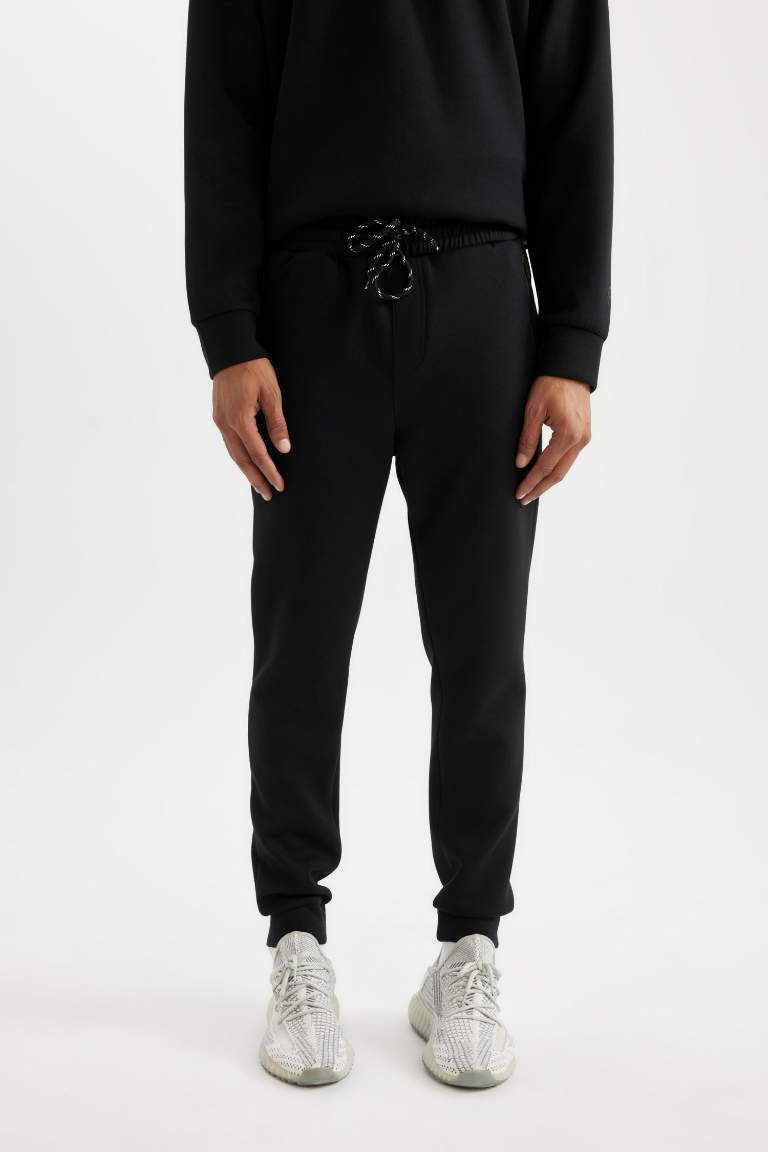 DeFactoFit Sporcu Jogger Eşofman Altı Slim Fit Dar Kesim Skuba Dalgıç Kumaş Standart Paça