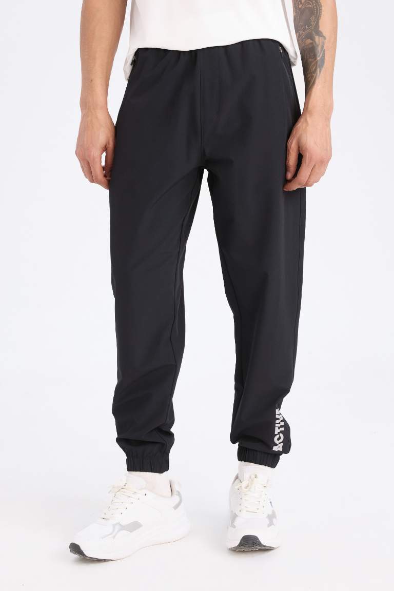 DeFactoFit Slim Fit Double Pocket Woven Sports Joggers