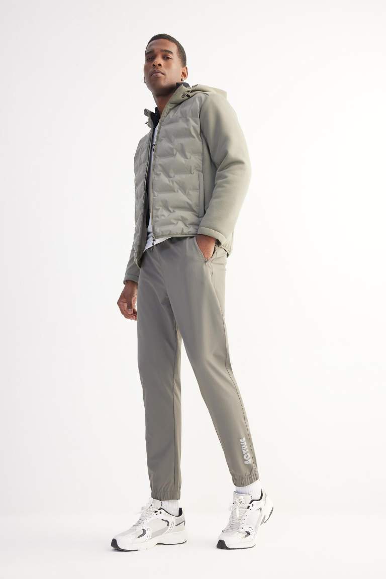 DeFactoFit Dokuma Esnek Multifonksiyonel Sporcu Jogger Eşofman Altı Slim Fit Dar Kesim Çift Cepli