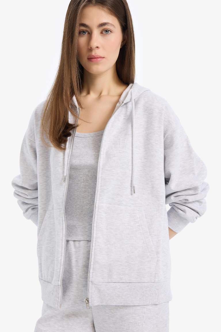 Sweat à capuche avec poches et fermeture zip Coupe décontractée