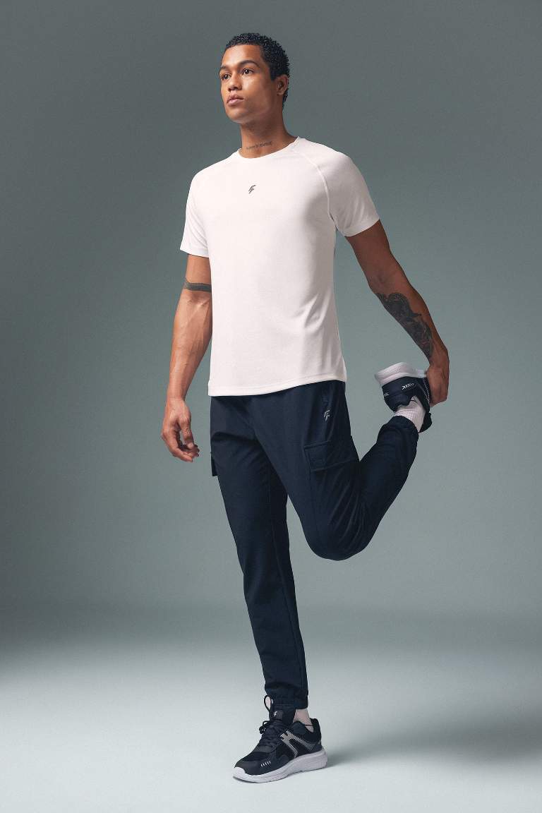 DeFactoFit Sporcu Jogger Eşofman Altı Standart Fit Dokuma Kargo Cepli Lastikli Paça