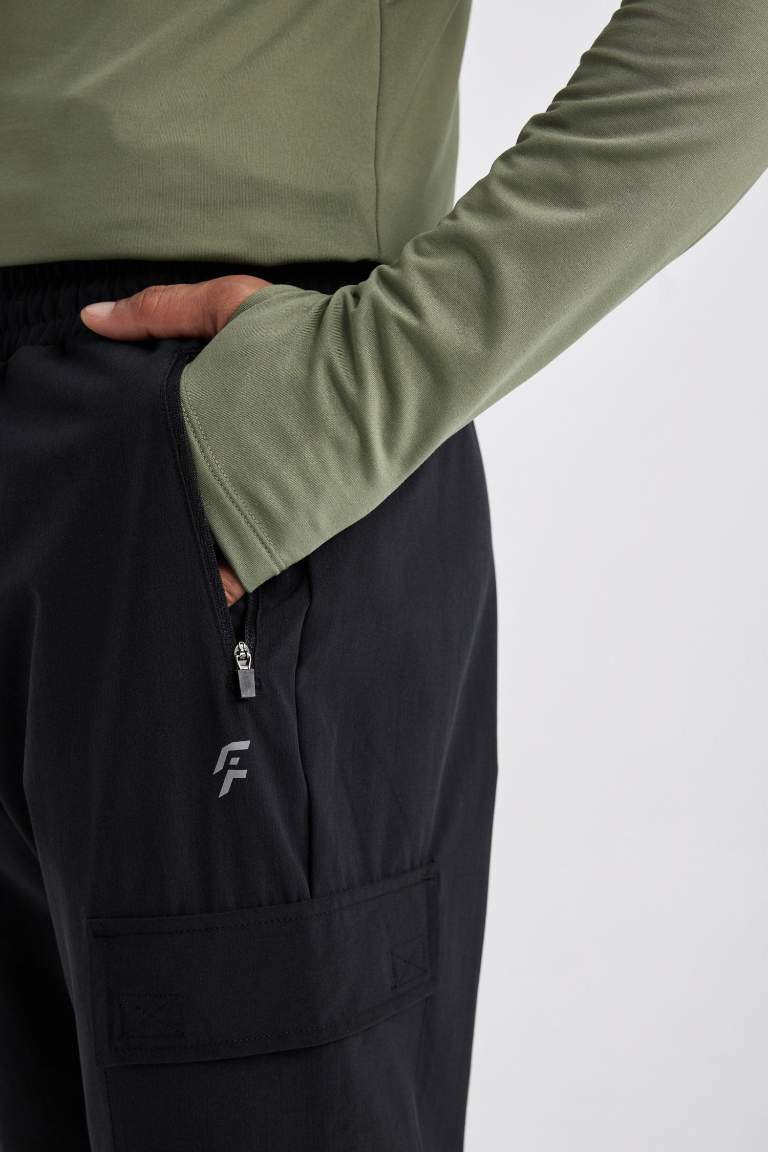 DeFactoFit Sporcu Jogger Eşofman Altı Standart Fit Dokuma Kargo Cepli Lastikli Paça