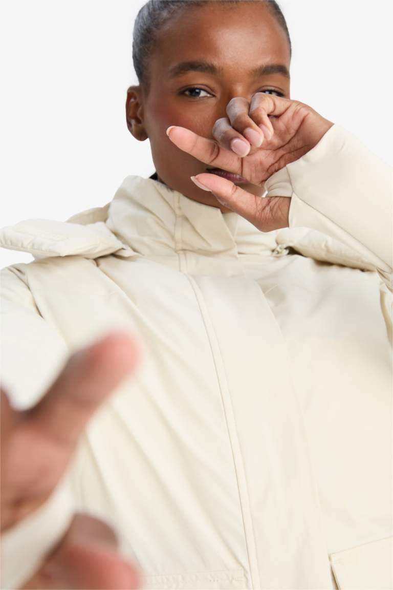 Jacket imperméable avec capuche et poches de DefactoFit