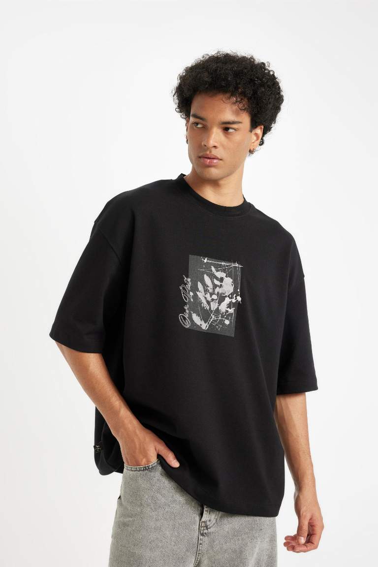 T-shirt noir Boxy manches courtes et col rond imprimé de Fleurs