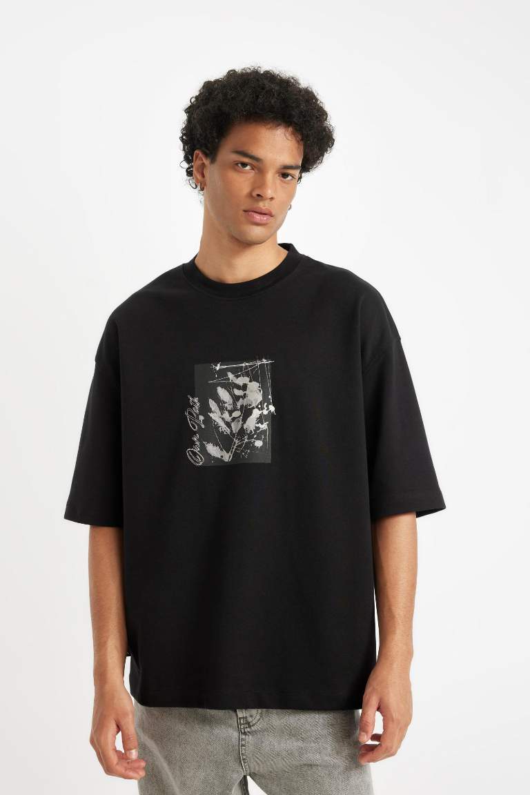 T-shirt noir Boxy manches courtes et col rond imprimé de Fleurs