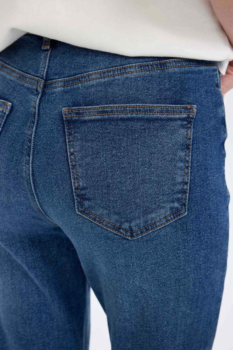 Pantalon Jean taille haute à effet délavé