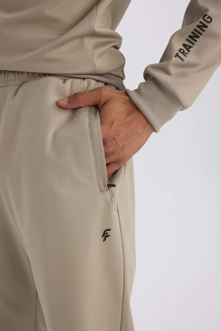 DeFactoFit Sporcu Jogger Eşofman Altı Loose Fit Beli Paçası Lastikli Cepli Pike
