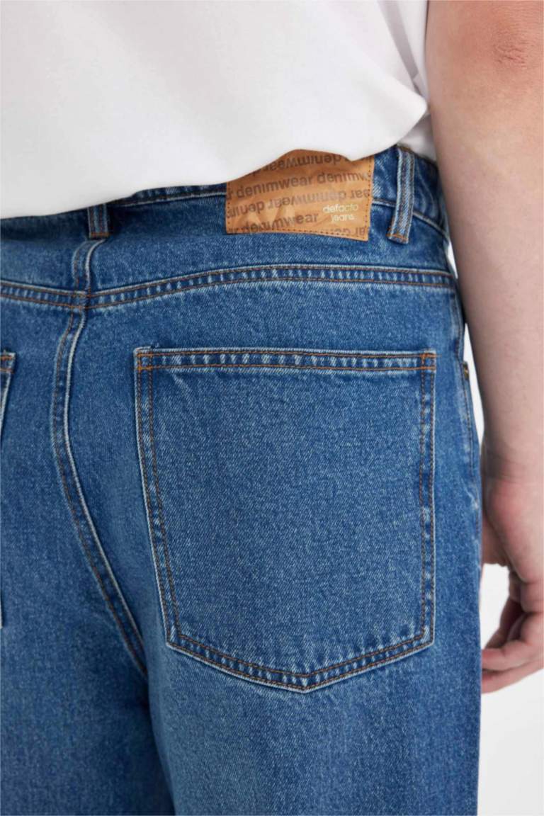 سروال جينز باجي بخصر عادي