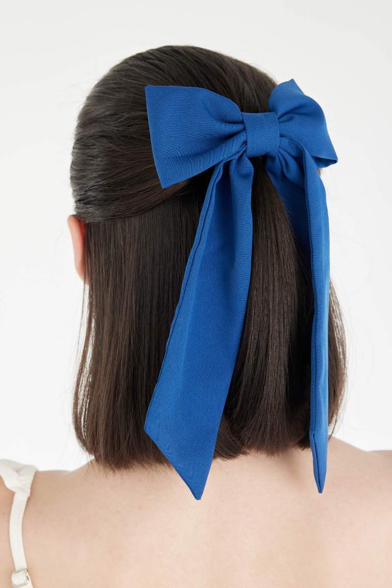 Barrette avec nœud bleu pour fille