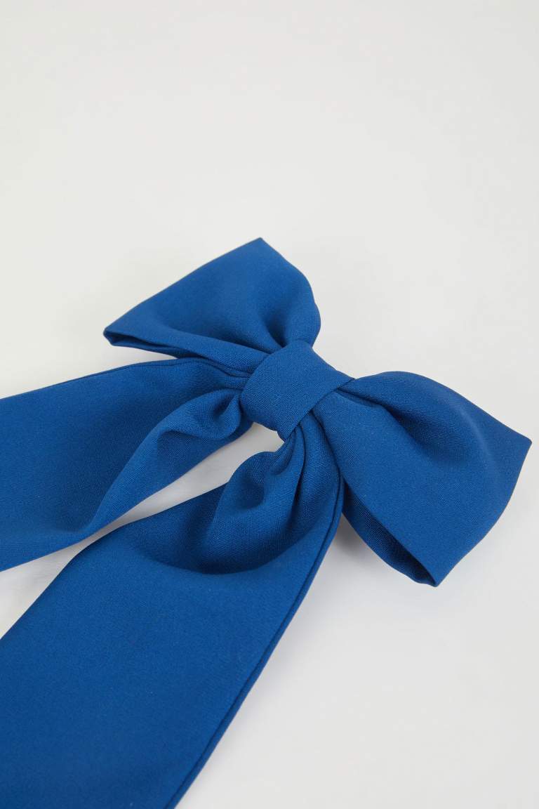 Barrette avec nœud bleu pour fille