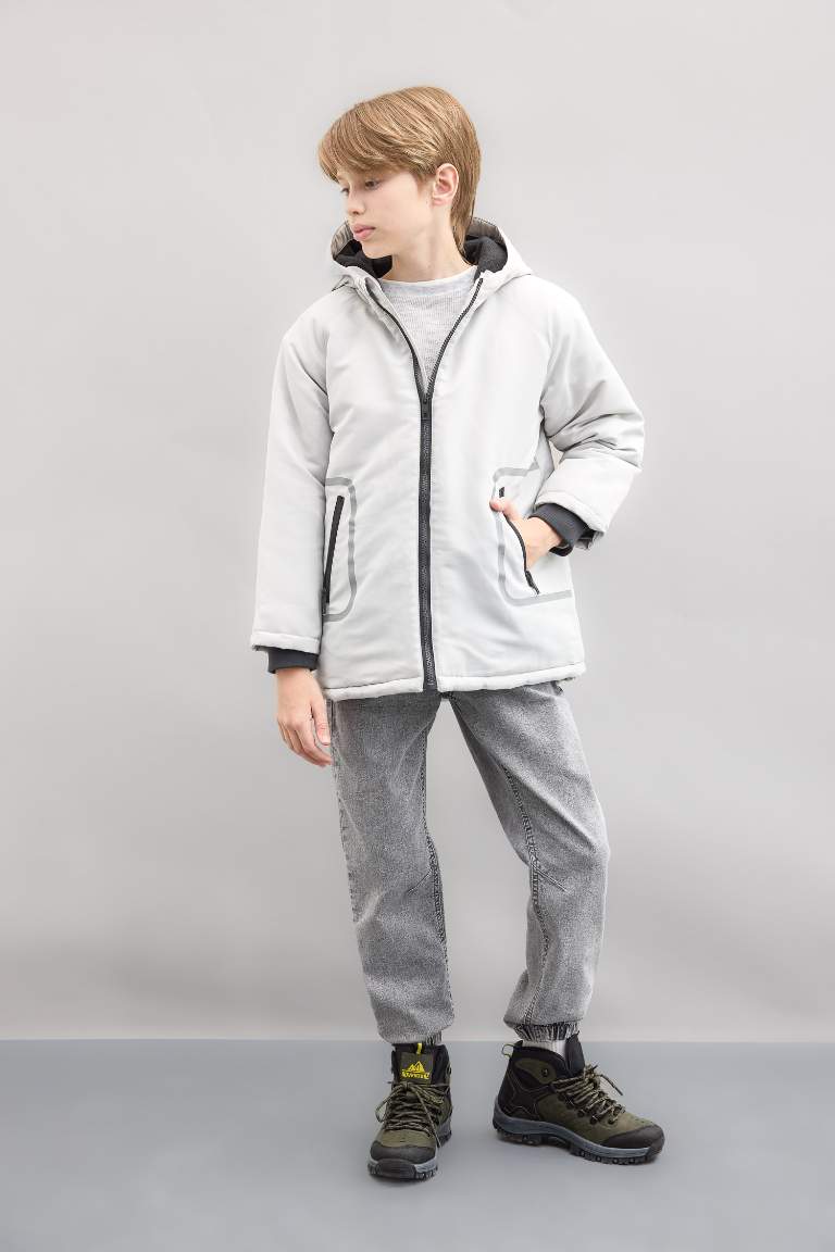 Manteau à capuche imperméableavec doublure en polaire et poches zippées pour Garçon