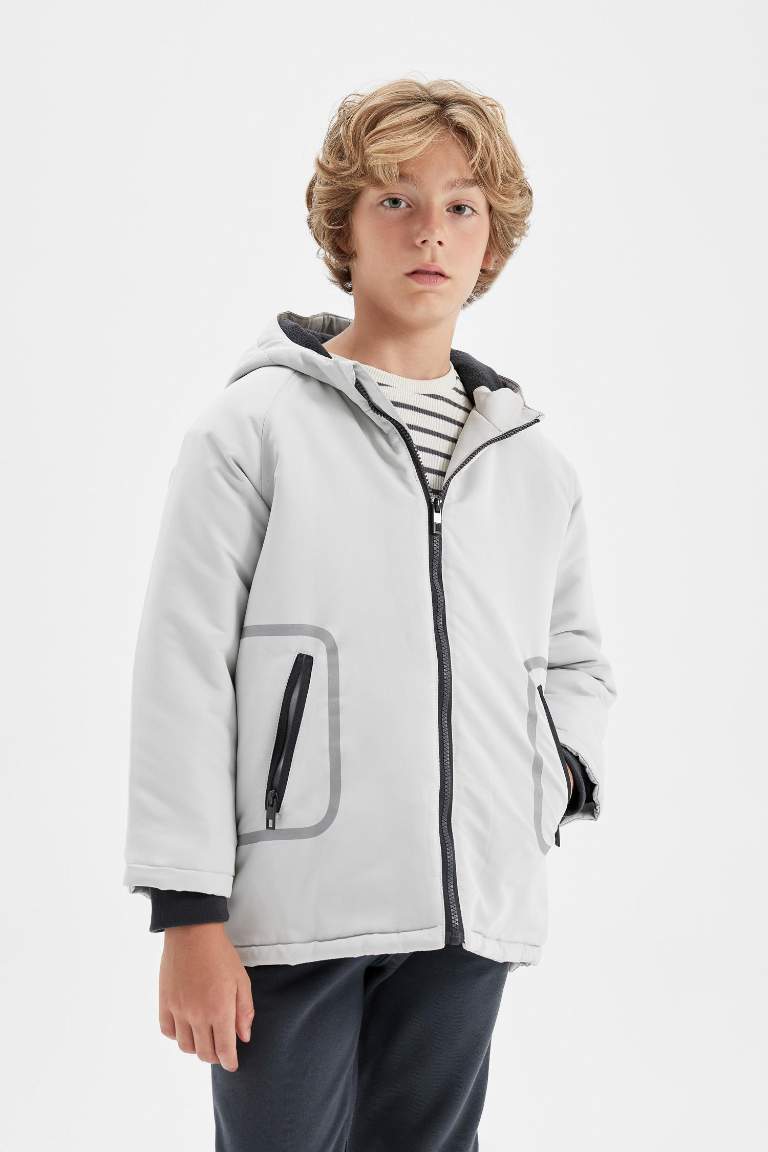 Manteau à capuche imperméableavec doublure en polaire et poches zippées pour Garçon