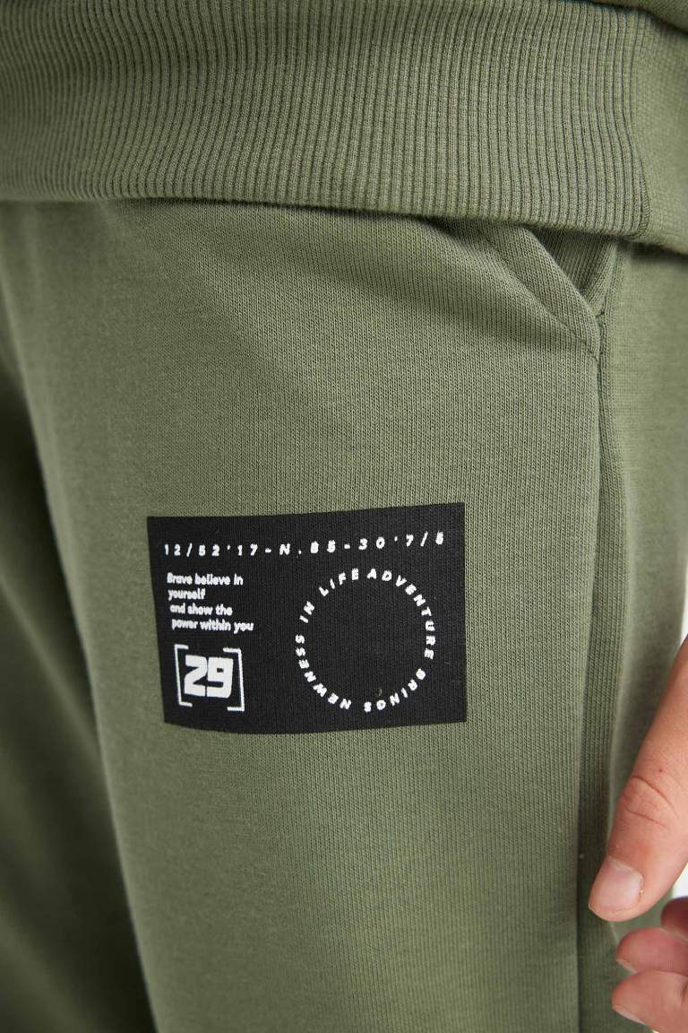 Pantalon Jogging tissé pour Garçon