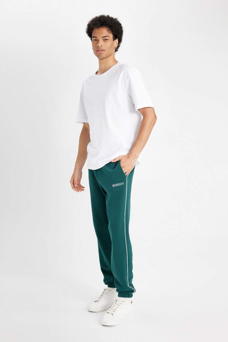 Regular Fit Jogger Eşofman Altı Fleto Cepli Baskılı Beli Bağcıklı Lastikli Paça