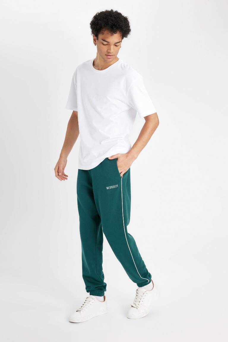 Regular Fit Jogger Eşofman Altı Fleto Cepli Baskılı Beli Bağcıklı Lastikli Paça